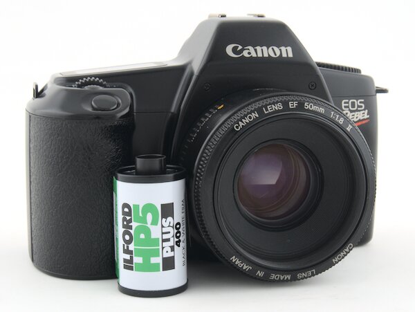 Step by step instructions with pictures on how to load 35mm film into the Canon EOS Rebel (Canon EOS 1000). Start taking photos with your Canon EOS Rebel camera today.