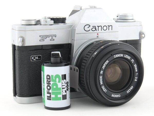 Step by step on how to load 35mm film into the Canon FT QL with pictures. Start using your Canon FT QL camera today.