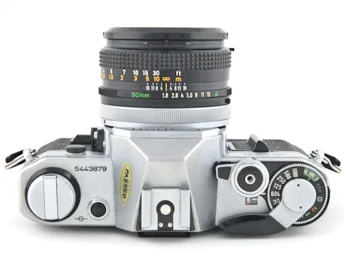 Canon AE1 Shutter Speed Dial and Film Advance Lever Top of a Canon AE-1