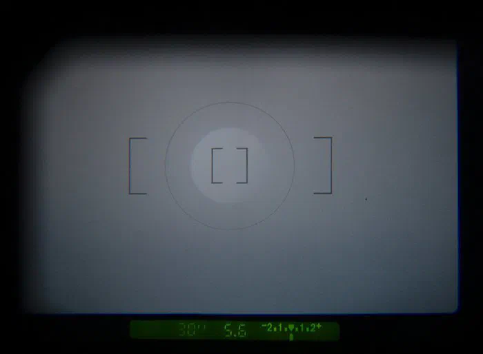 Camera Viewfinder showing Shutter Speed, Aperture, and Exposure Compensation