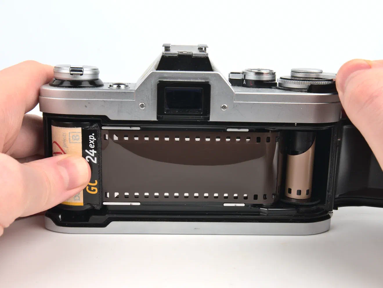 Canon AE-1 advance film Canon AE-1 advance film