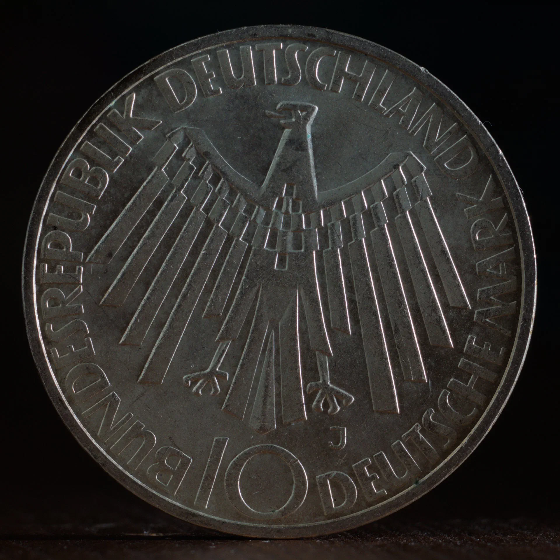 1972 Munich Olympics 10 Mark Coin – Mint Mark J (Hamburg) – Reverse Reverse of the 1972 Munich Olympics German 10 Mark silver coin struck at the Hamburg mint, identified by the J mint mark