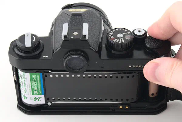 Advance the film and fire the shutter on the Nikon FM2 Advance the film and fire the shutter on the Nikon FM2