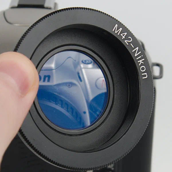 M42 Lens Adapter with Glass to Correct Infinity Focus M42 Lens Adapter with Glass to Correct Infinity Focus