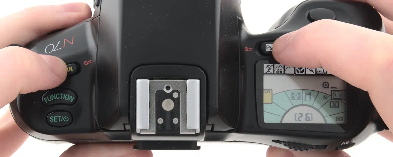 Nikon N70 film rewind buttons