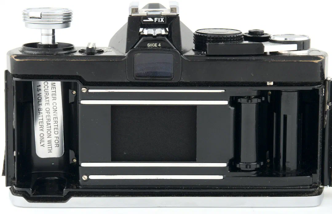 A label showing that an Olympus OM-1 has had a Schottkey diode conversion so it can use non-mercury batteries. A label showing that an Olympus OM-1 has had a Schottkey diode conversion so it can use non-mercury batteries.