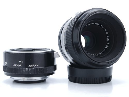 Nikon PC 55mm f/3.5 Macro lens review. This lens has a Non-AI F-mount that can damage camera mounts. Adapting to a mirrorless camera will avoid the problem.