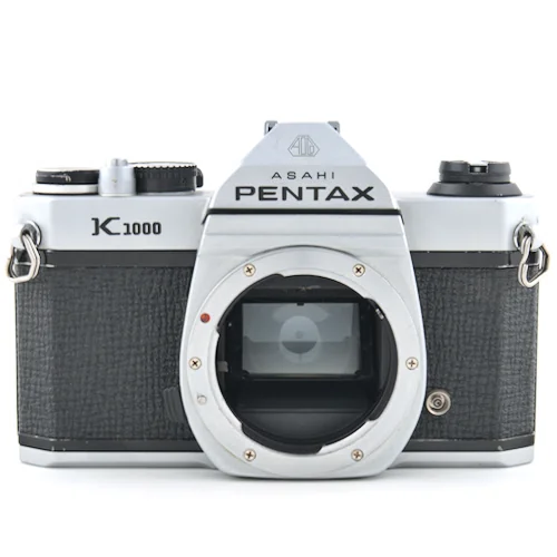 The Pentax K-mount, introduced by Pentax in 1975, is a versatile bayonet lens mount designed for 35 mm single-lens reflex cameras, evolving over the years with added features to accommodate advancements in camera technology from film to digital.